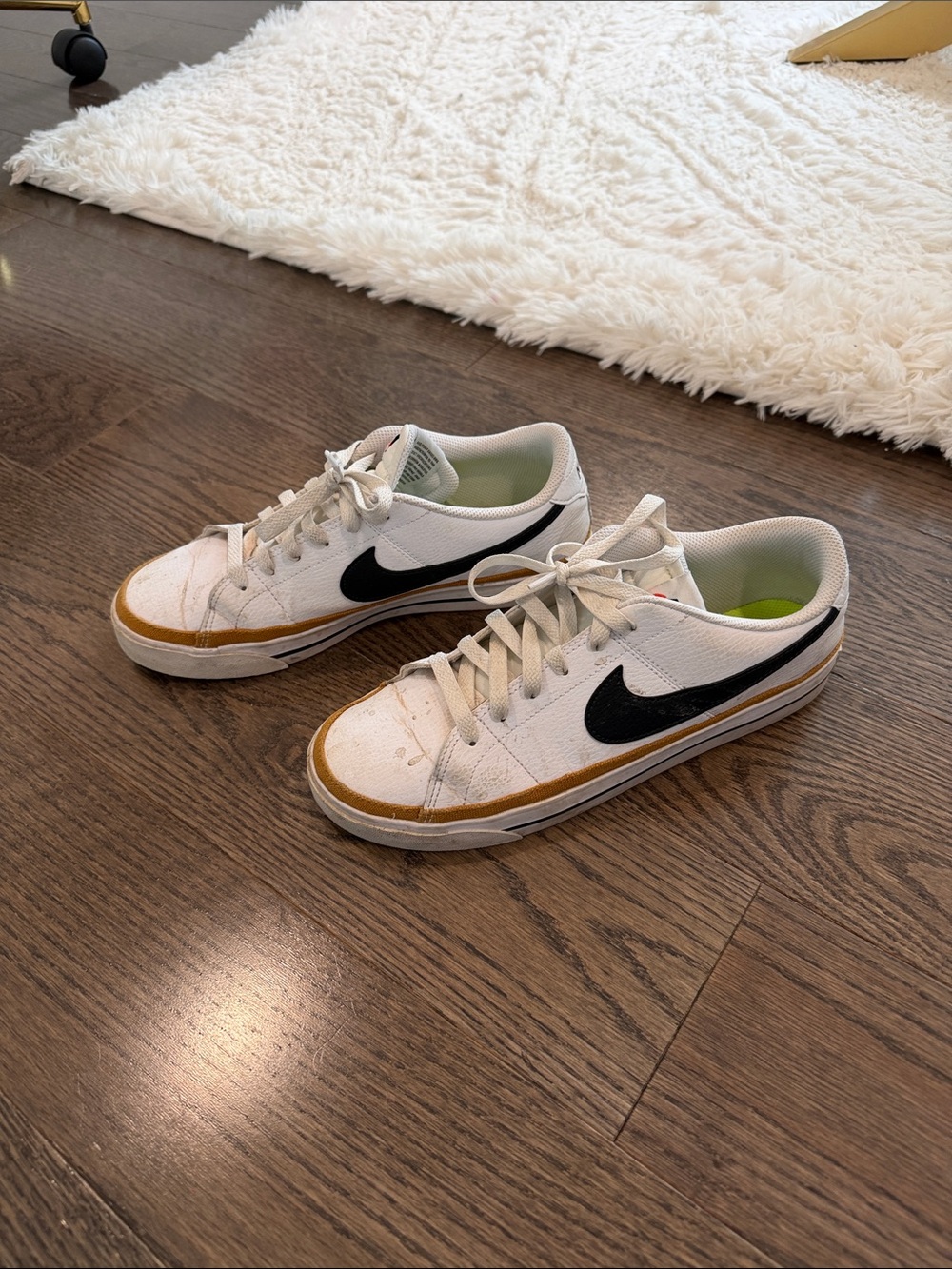 Nike women’s White Sneakers with Black Swoosh and Tan Accent-legacy style size 9